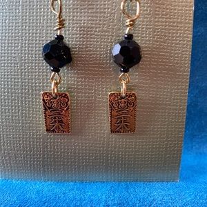 Handmade earrings. Gold plated Nisshu charm